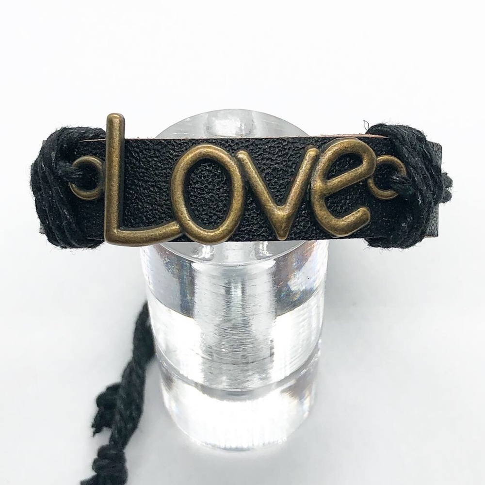 Black leather bracelet.